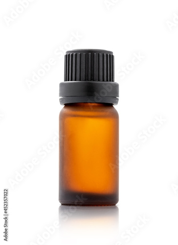 Brown cosmetic serum bottle isolated on white background