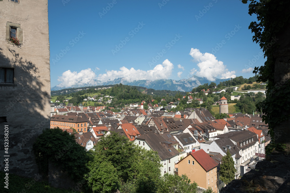 Cityscape of Feldkirch from the heights of the 12th century medieval Schattenburg castle on a summer day with blue sky, Vorarlberg, Austria, Europe.