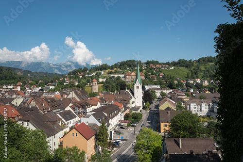 Cityscape of Feldkirch from the heights of the 12th century medieval Schattenburg castle on a summer day with blue sky, Vorarlberg, Austria, Europe. photo