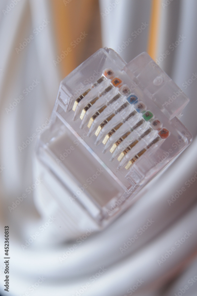 connector of a network cable rg 45. close-up. connector of a network cable rg 45. close-up.