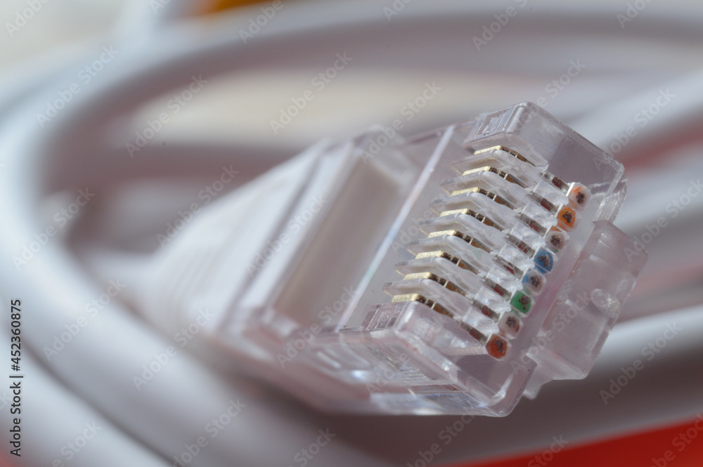 connector of a network cable rg 45. close-up. connector of a network cable rg 45. close-up.