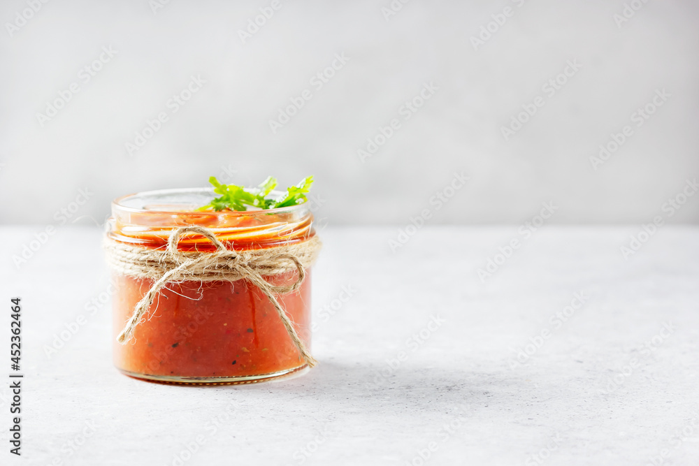 Authentic Spanish Sofrito sauce made with tomato, peppers, onion, garlic, herbs and olive oil in