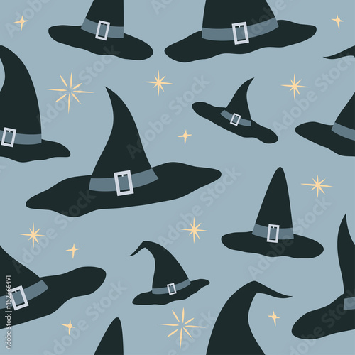 Witch hat and pixie dust Halloween seamless pattern. Wrapping paper vector illustration. Blue background.