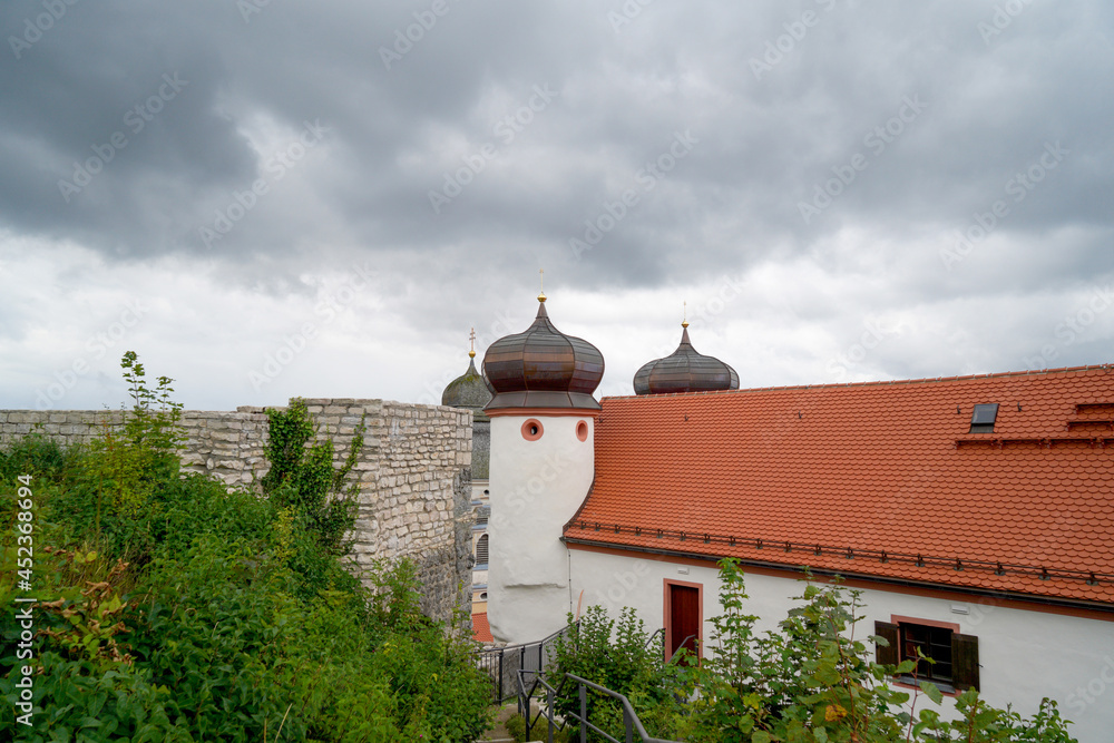 Onion dome with onion helmet or onion dome photographed on a church tower as an architectural roof construction in Bavaria