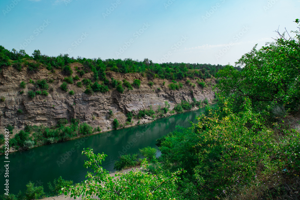 Canyon with blue water river in autumn. Selective focus. Canyon with blue water river in autumn. Selective focus.