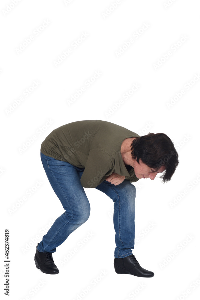 crouching woman looking at the ground as if she lost something on white background crouching woman looking at the ground as if she lost something on white background