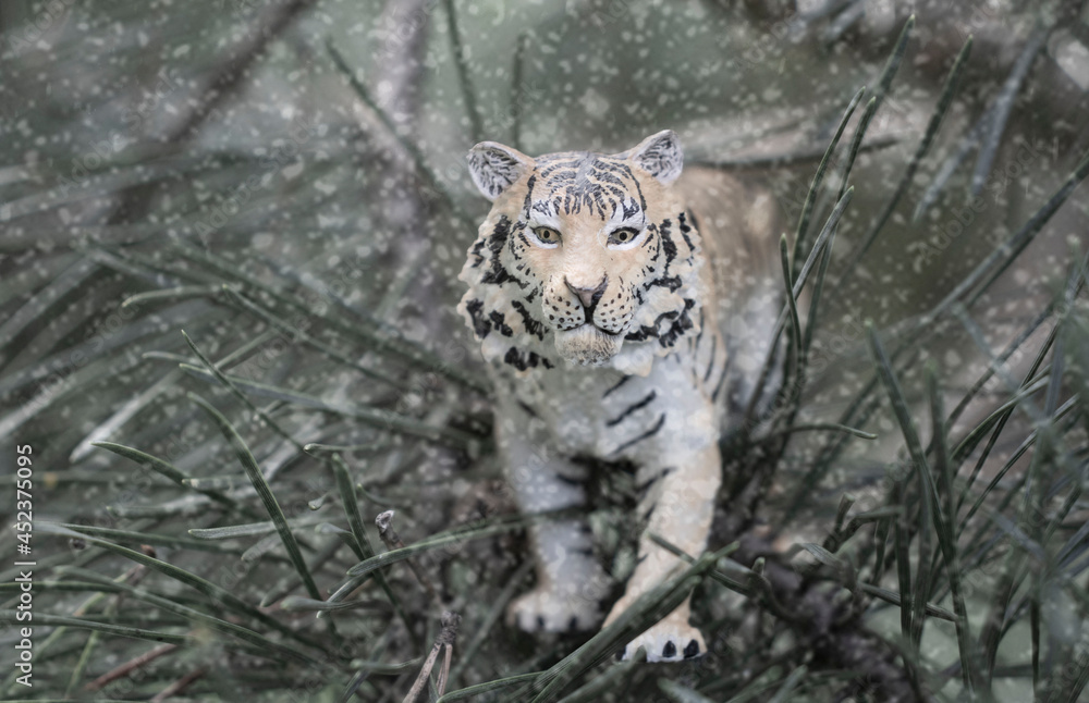 Fototapeta premium symbol of 2022 tiger on the background of the Christmas tree