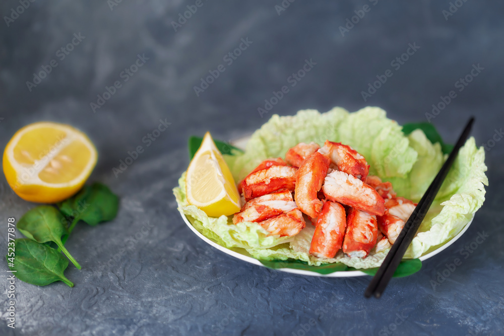 Crab meat on a fork. Cooked seafood. Crab meat in a fork for a gourmet dinner. Isolate on a white background Crab meat on a fork. Cooked seafood. Crab meat in a fork for a gourmet dinner. Isolate on a white background
