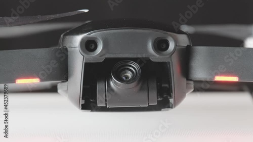 Drone quadcopter initiation camera closeup, futuristic gadget and electronics, professional tool for video and photo 60 fps 4K