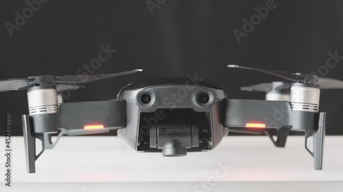 Drone quadcopter initiation camera front view, futuristic gadget and electronics, professional tool for video and photo 60 fps 4K