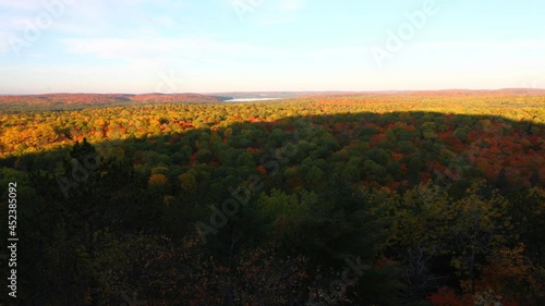 Timelapse at sunrise on an Algonquin forest in fall photo