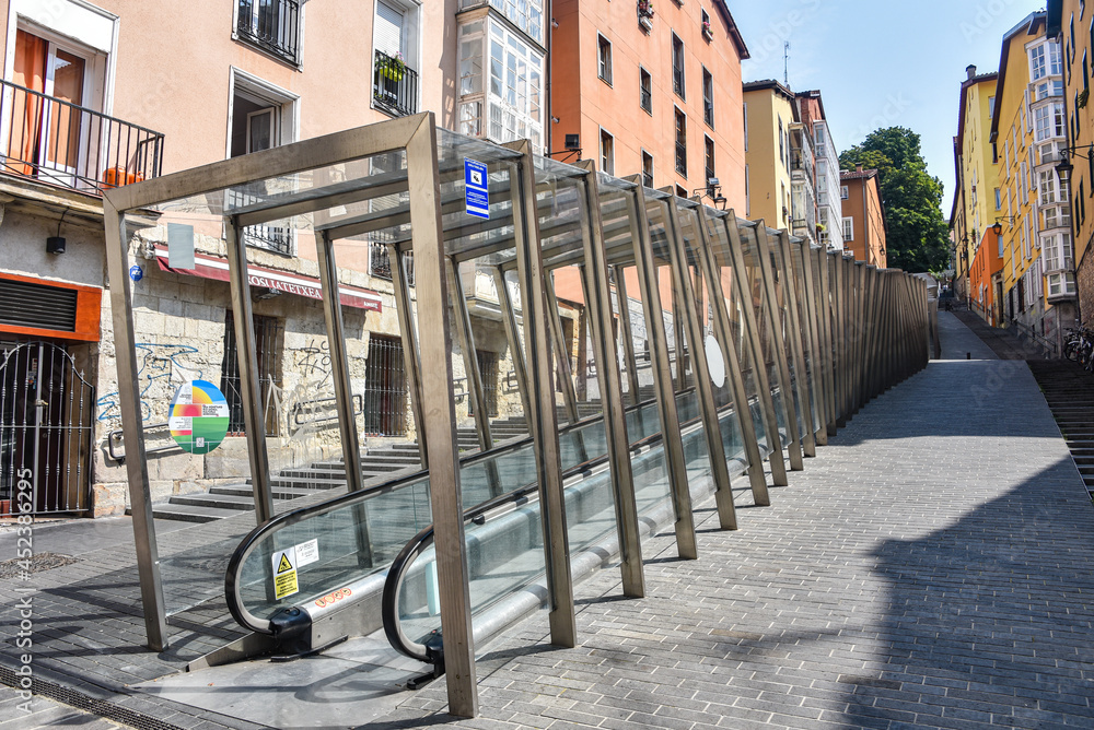 Fototapeta premium Vitoria-Gasteiz, Spain - 21 August, 2021: Urban escalators as public transport in old town Vitoria Gasteiz