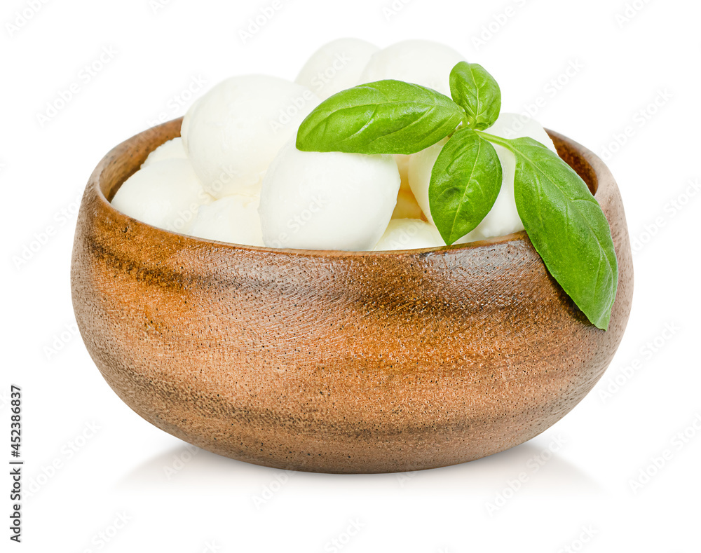 mozzarella cheese and basil leaves in wooden plate on isolated white background mozzarella cheese and basil leaves in wooden plate on isolated white background