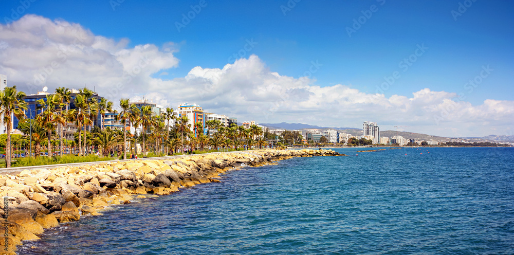 Fototapeta premium The Promenade of Limassol, panorama, tourists are enjoying Cypriot spring on the shores of the Mediterranean sea, Republic of Cyprus