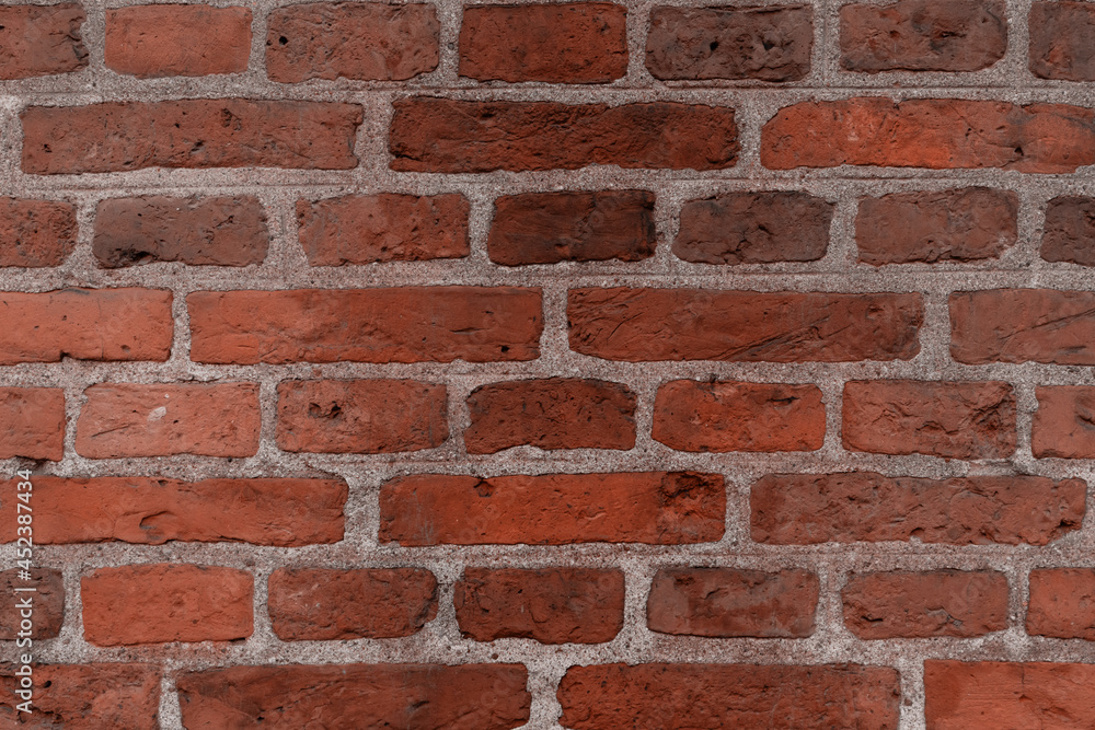 Obraz premium Textured background from a red brick wall pattern