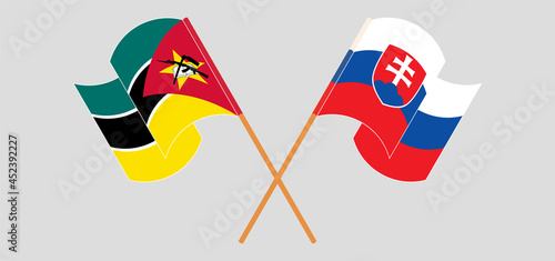 Photography Crossed and waving flags of Mozambique and Slovakia
