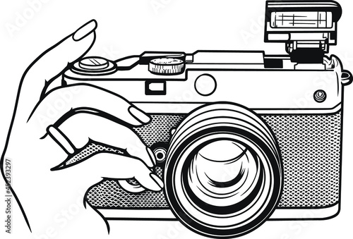 Hand holding digital camera black and white vector logo
