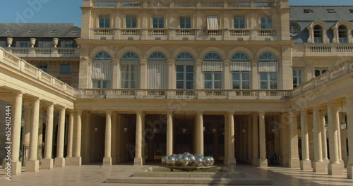 Empty Domaine With The Spheres Fountain Of The Palais Royal In Paris, France During COVID-19 Pandemic. - tilt up photo