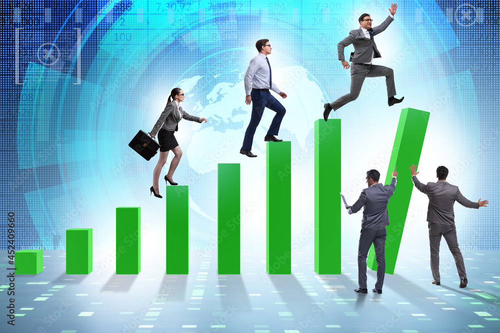 Business people supporting economic growth on chart Business people supporting economic growth on chart