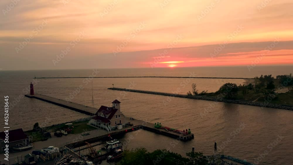 Aerial of Muskegon Channel at sunset. Creative drone side pan motion. Aerial of Muskegon Channel at sunset. Creative drone side pan motion.