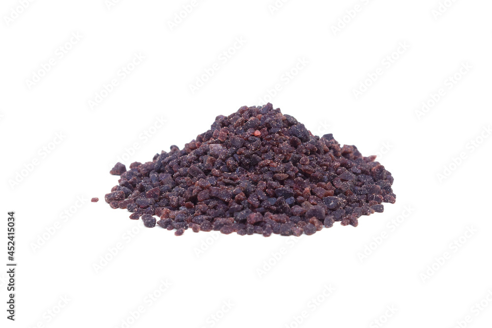 A pile of black Himalayan salt isolated on white background A pile of black Himalayan salt isolated on white background