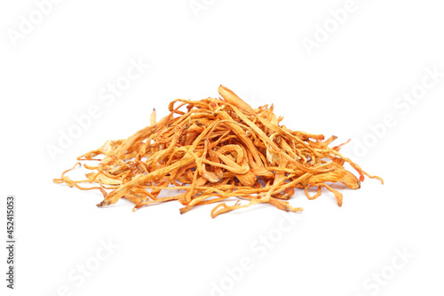 A pile of dried ginseng fibrous root isolated on white background photo