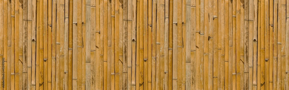 Panorama of Brown old Bamboo fence texture and background seamless Panorama of Brown old Bamboo fence texture and background seamless