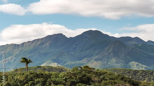 Mount Koghi dominates the paradisiacal landscape of New Caledonia - cloudscape time lapse photo