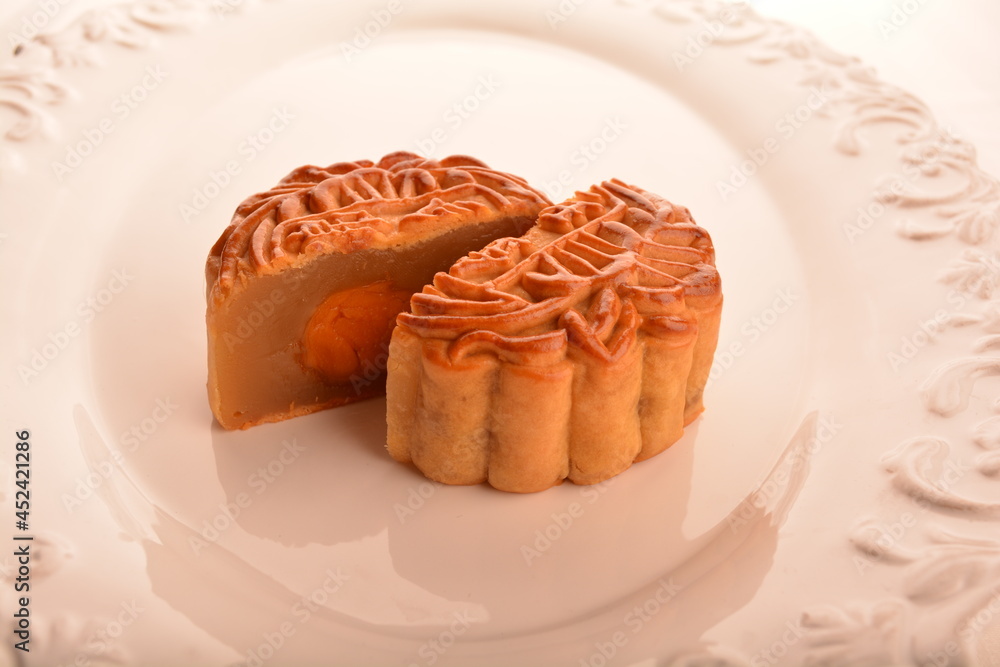 traditional Chinese baked mooncake lotus, egg yolk, red bean, mixed nuts pastry for mid autumn festival