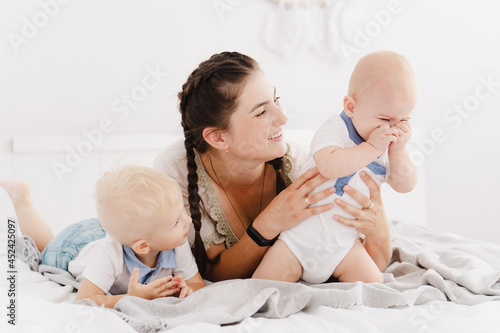 happy mom with two sons