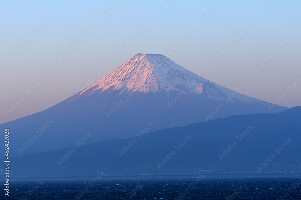 Mt. Fuji at dusk overlooking Suruga Bay.
