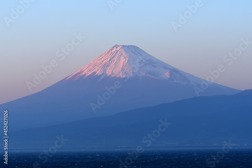 Mt. Fuji at dusk overlooking Suruga Bay.