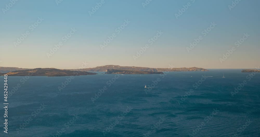Day time lapse view of the Santorini volcanic caldera, Cyclades Islands, Greece Day time lapse view of the Santorini volcanic caldera, Cyclades Islands, Greece