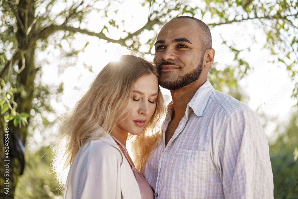 Close up of young couple in love enjoying time together outdoors Close up of young couple in love enjoying time together outdoors