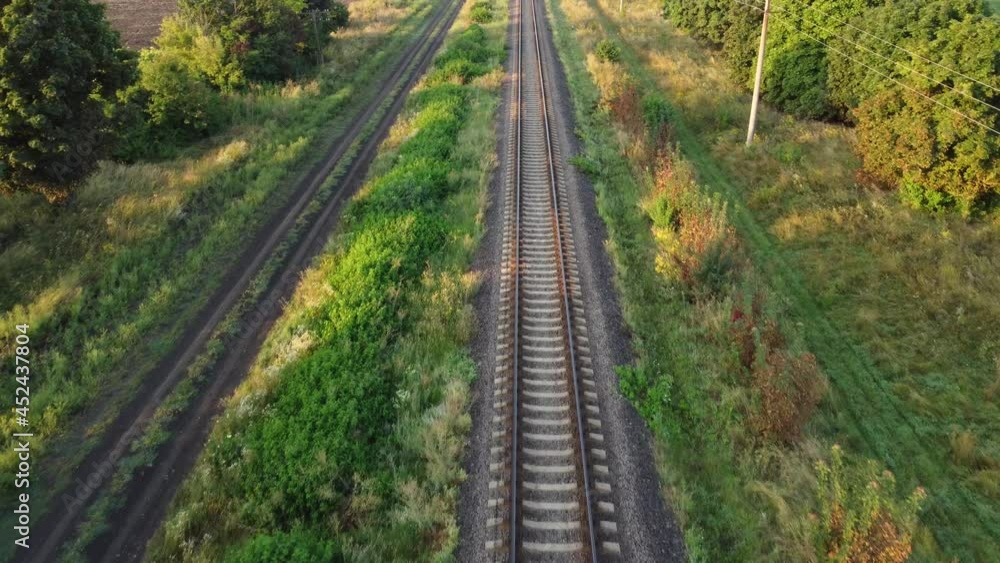 Railroad tracks top view. Flight over the road with rails Railroad tracks top view. Flight over the road with rails