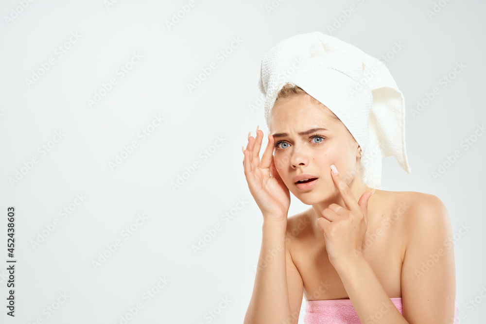 pretty woman holding face skin care dermatology close-up pretty woman holding face skin care dermatology close-up