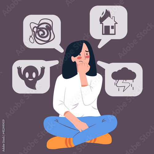 the girl with ptsd anxiety post traumatic syndrome disorder in blue is sitting and feel sad imagine the fire, wild animal, lightning