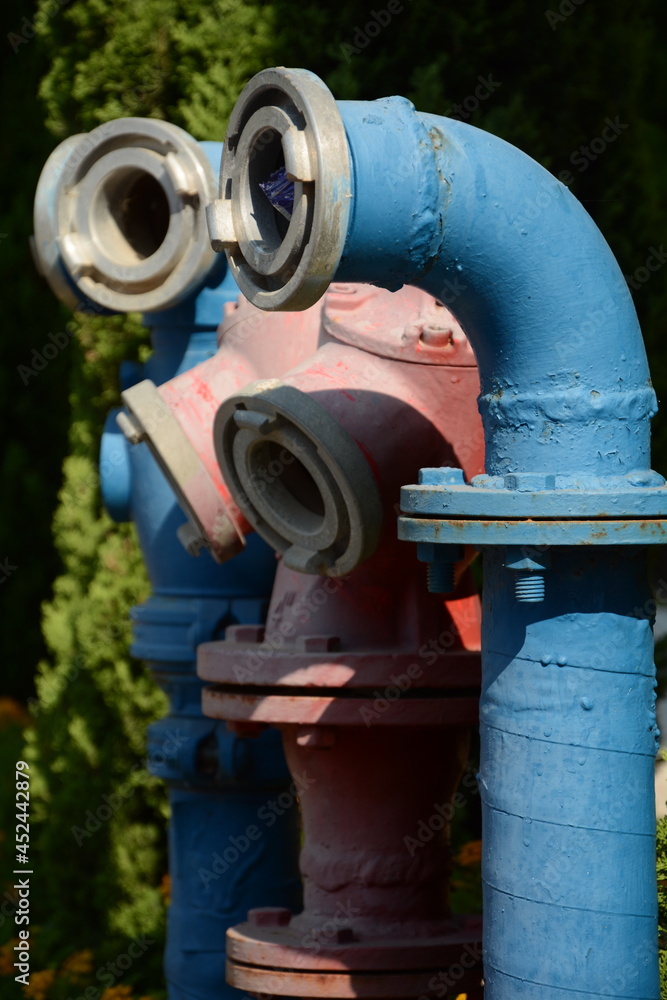 Metal high pressure water fire hydrants. Fire hydrant on the street in a city of Israel Metal high pressure water fire hydrants. Fire hydrant on the street in a city of Israel