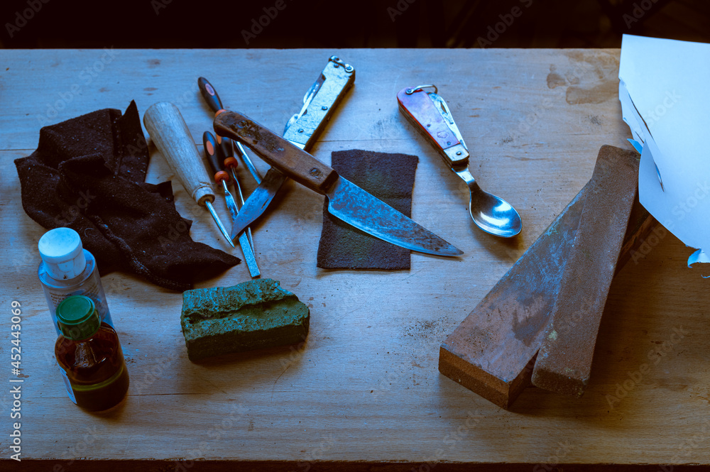Sharpening an old knife. Restoration of an old knife. Sharpen a knife ...
