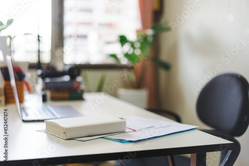 Student studying table and workplace with laptop and notebook in home office during COVID-19 pandemic