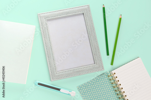 flat lay picture fream and stationery photo