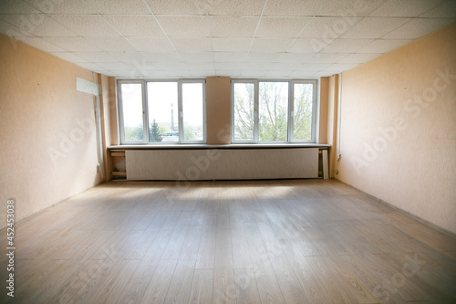 Empty room with beige walls.