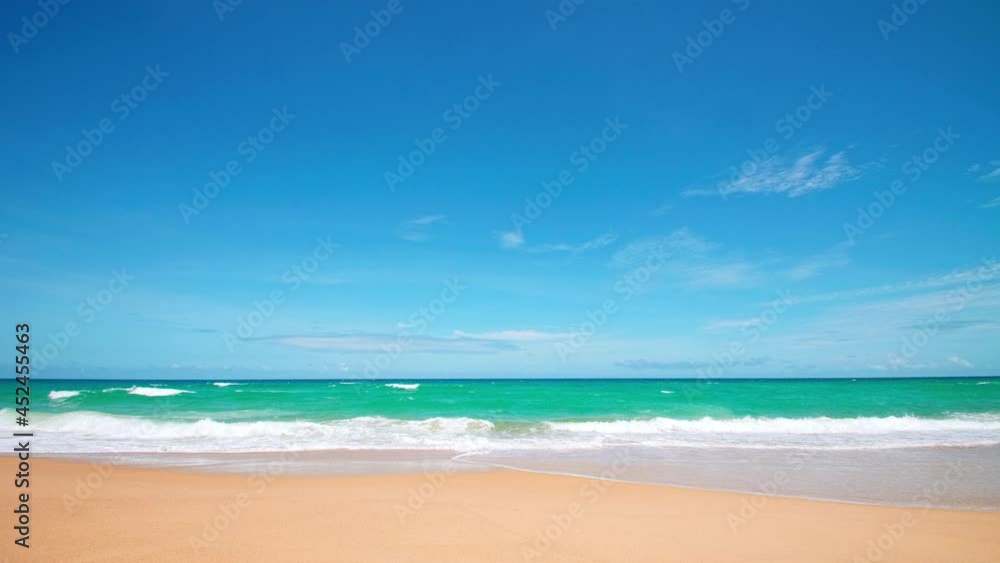 4K Beautiful tropical beach with blue sky and clouds. Tropical beach with waves crashing empty beach. Andaman Phuket beach Thailand. Sea sand and sky on beautiful summer day holiday vacation freedom 4K Beautiful tropical beach with blue sky and clouds. Tropical beach with waves crashing empty beach. Andaman Phuket beach Thailand. Sea sand and sky on beautiful summer day holiday vacation freedom