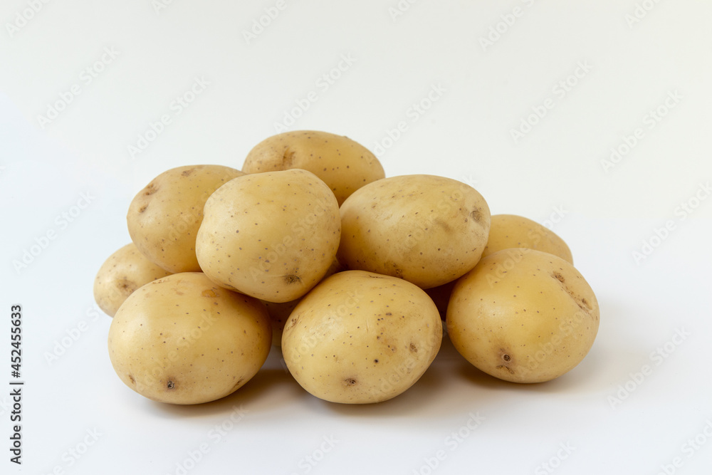 pile of potatoes isolated on white background pile of potatoes isolated on white background