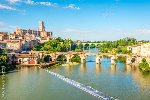 View at the Albi town with Old bridge over Tarn river, France photo