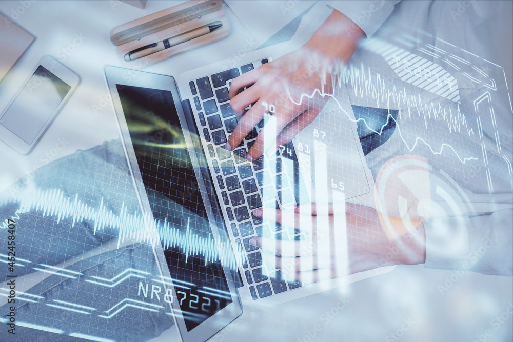 Double exposure of woman hands working on computer and tech theme hologram drawing. Top View. Technology concept. Double exposure of woman hands working on computer and tech theme hologram drawing. Top View. Technology concept.
