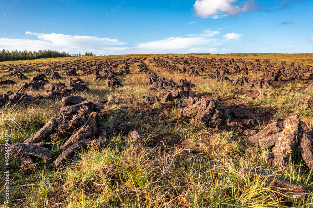 Naklejka premium Peat piled on a peat bog in County Donegal - Ireland