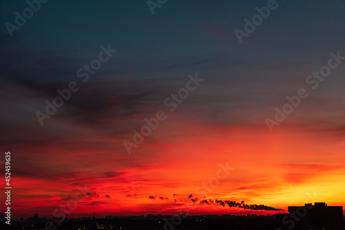 orange sunset over big city