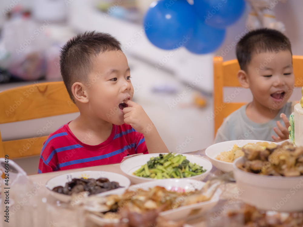 Asian little boy celebrating birthday Asian little boy celebrating birthday