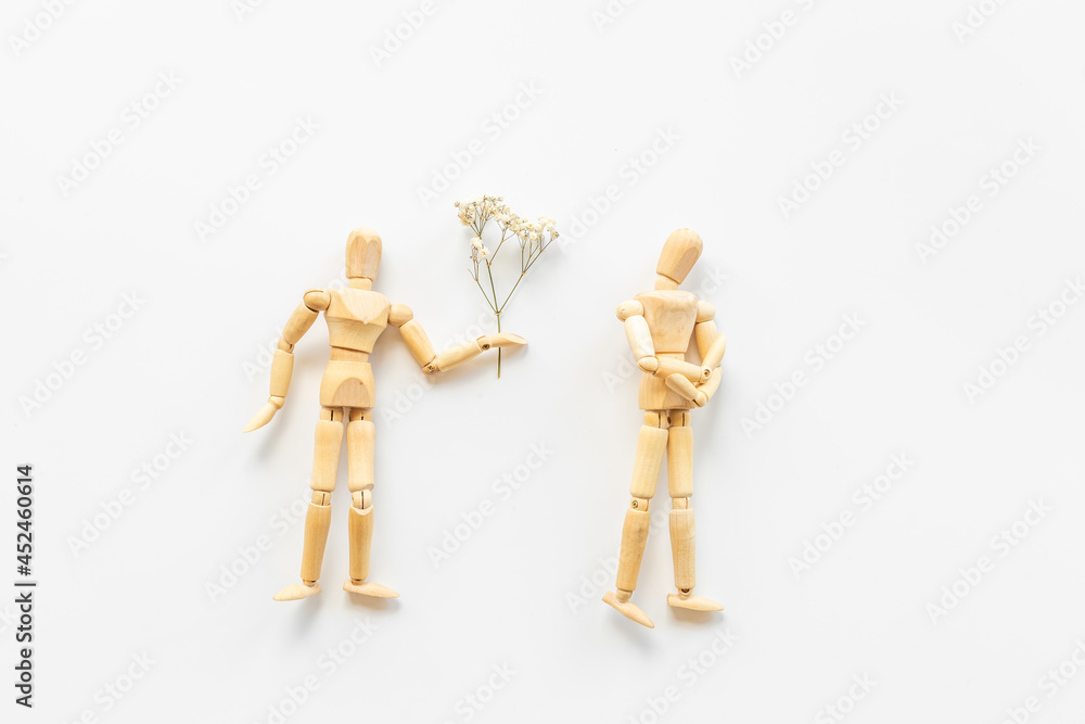 Man and woman connection. Couple of wooden mannequin figures. Man and woman connection. Couple of wooden mannequin figures.
